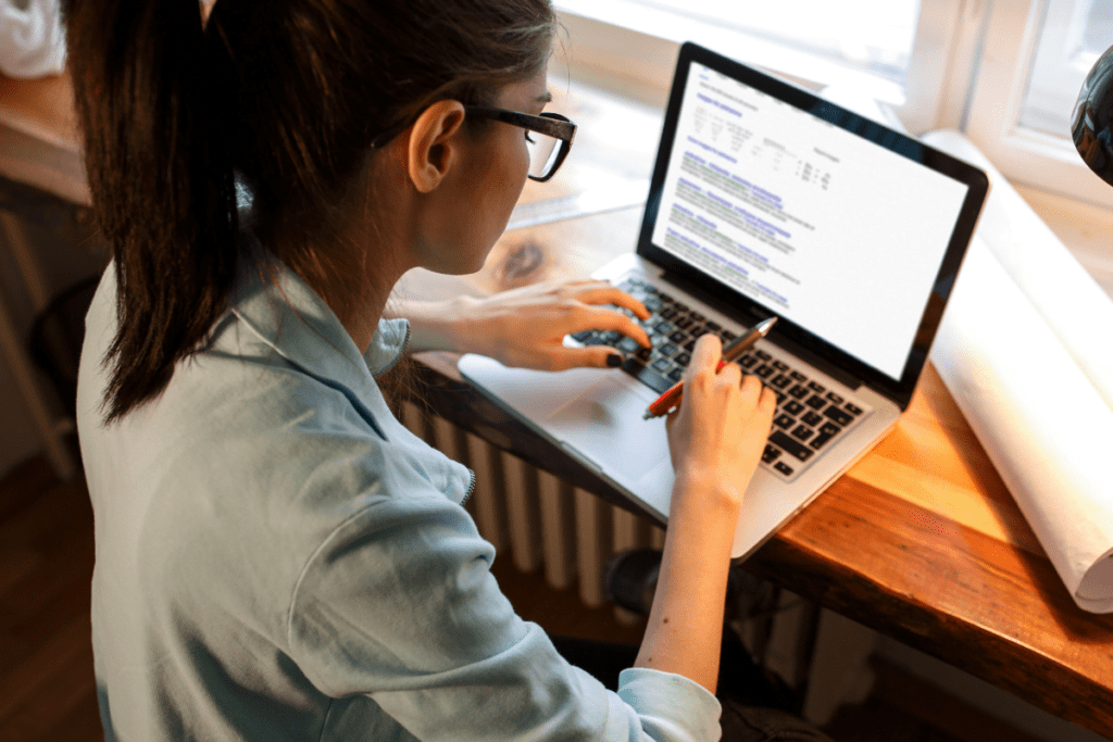 An entrepreneur researches automation tools for her creative business.