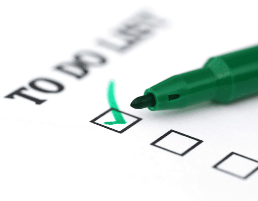 A green marker checks off a box on a “To Do” list. Providing the right resources to support your virtual assistant duties will ensure they can execute their tasks and projects properly.